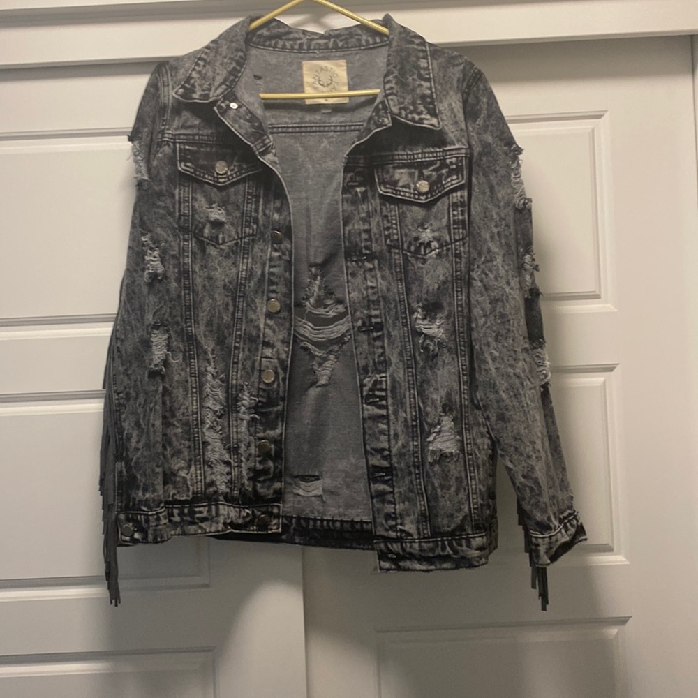 Never worn Jean distressed jacket